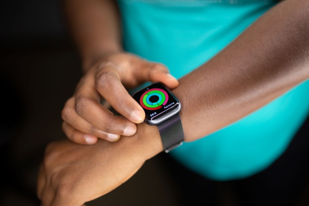 Person with a wearable fitness tracker